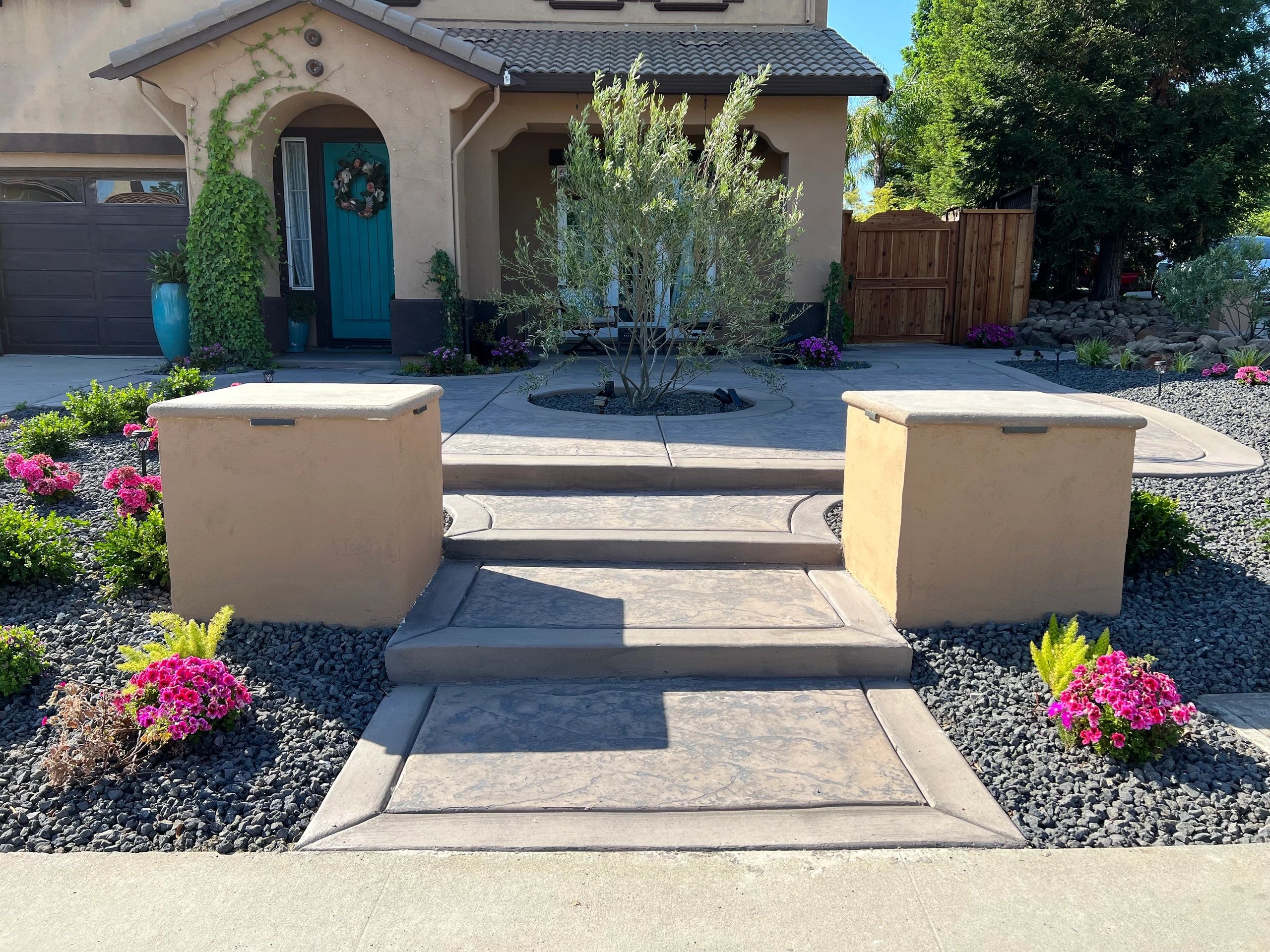 Modern home front entrance with landscaping