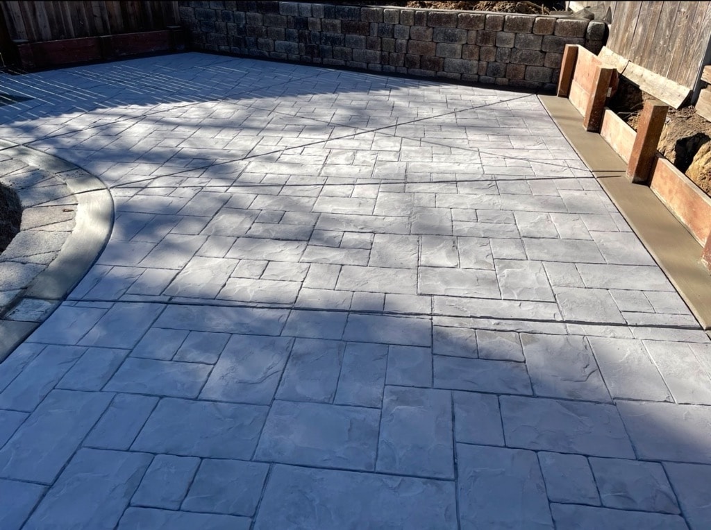 Paved patio with herringbone pattern layout